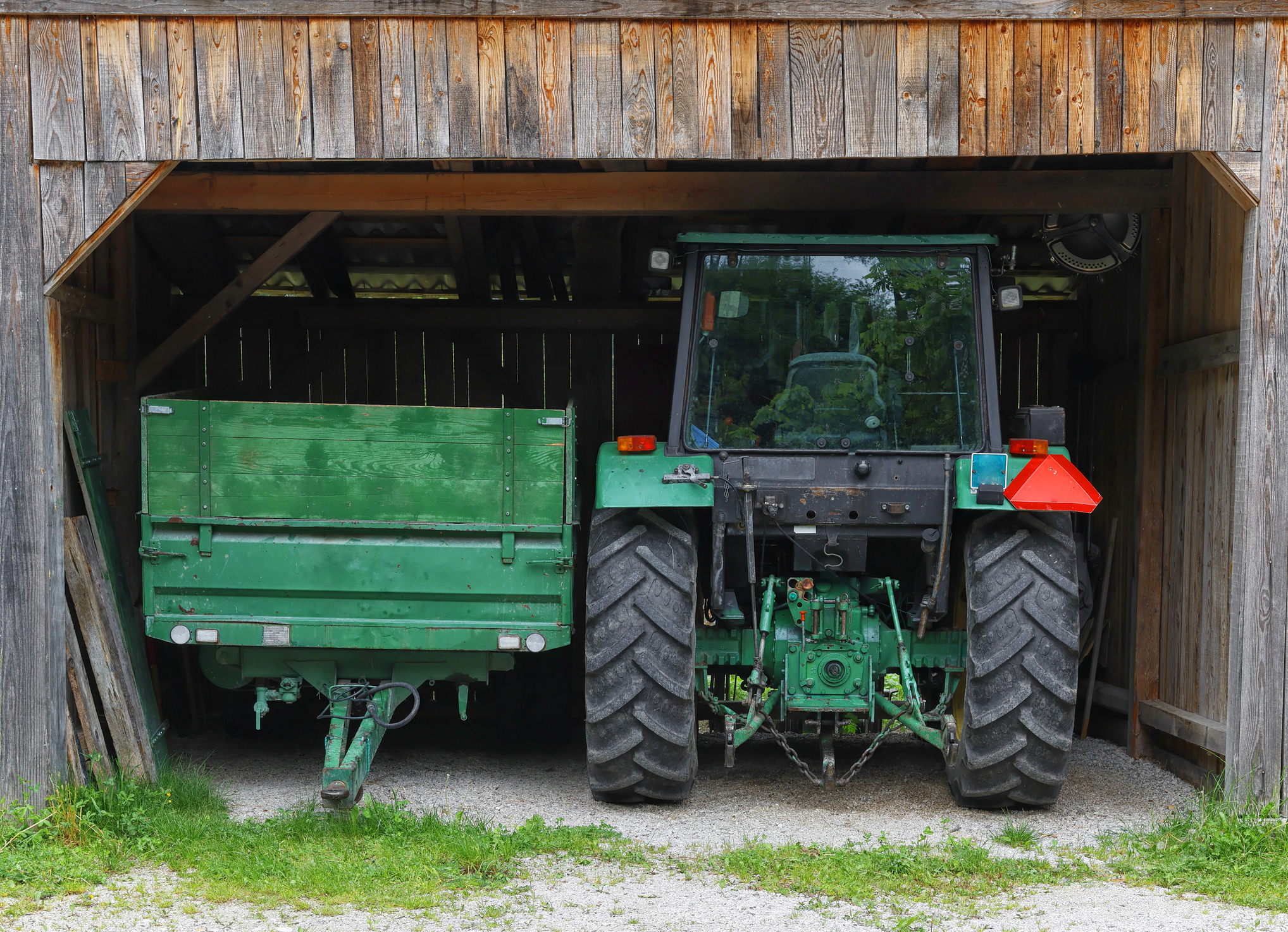 Tractor in a farm, a modern agricultural transport, modern tractor